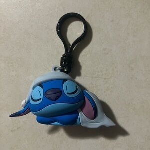 Stitch sleeping keychain. I tried to clean, won’t come off